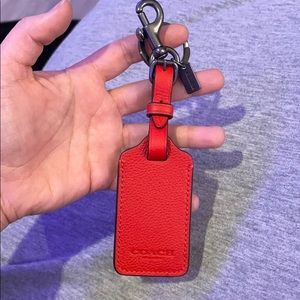 Coach red pebble leather travel bag tag